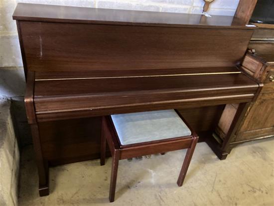A Kemble upright piano and stool, width 150cm